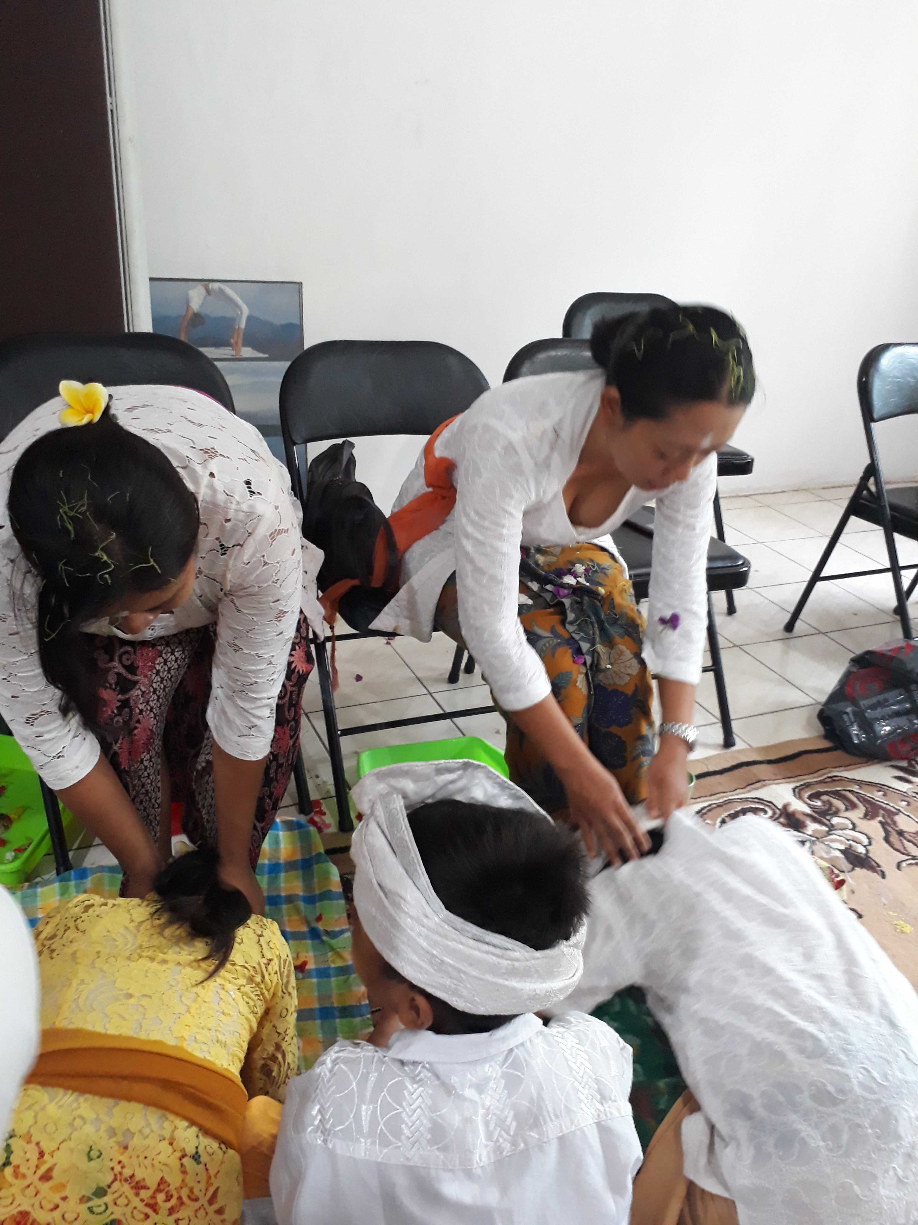 Parents blessing children