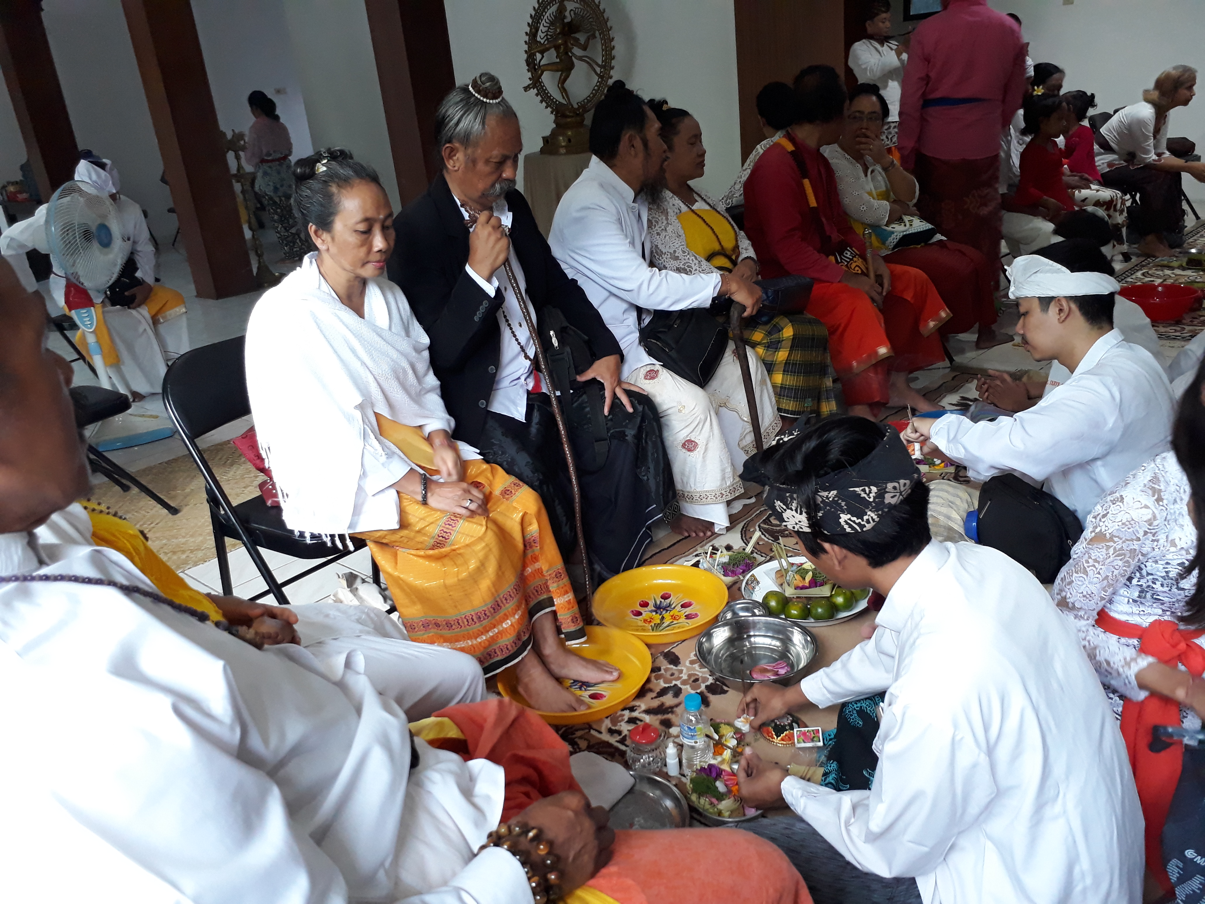 Children and parents prepare for the MatruPitru Vandanam in Bali December 17, 2017